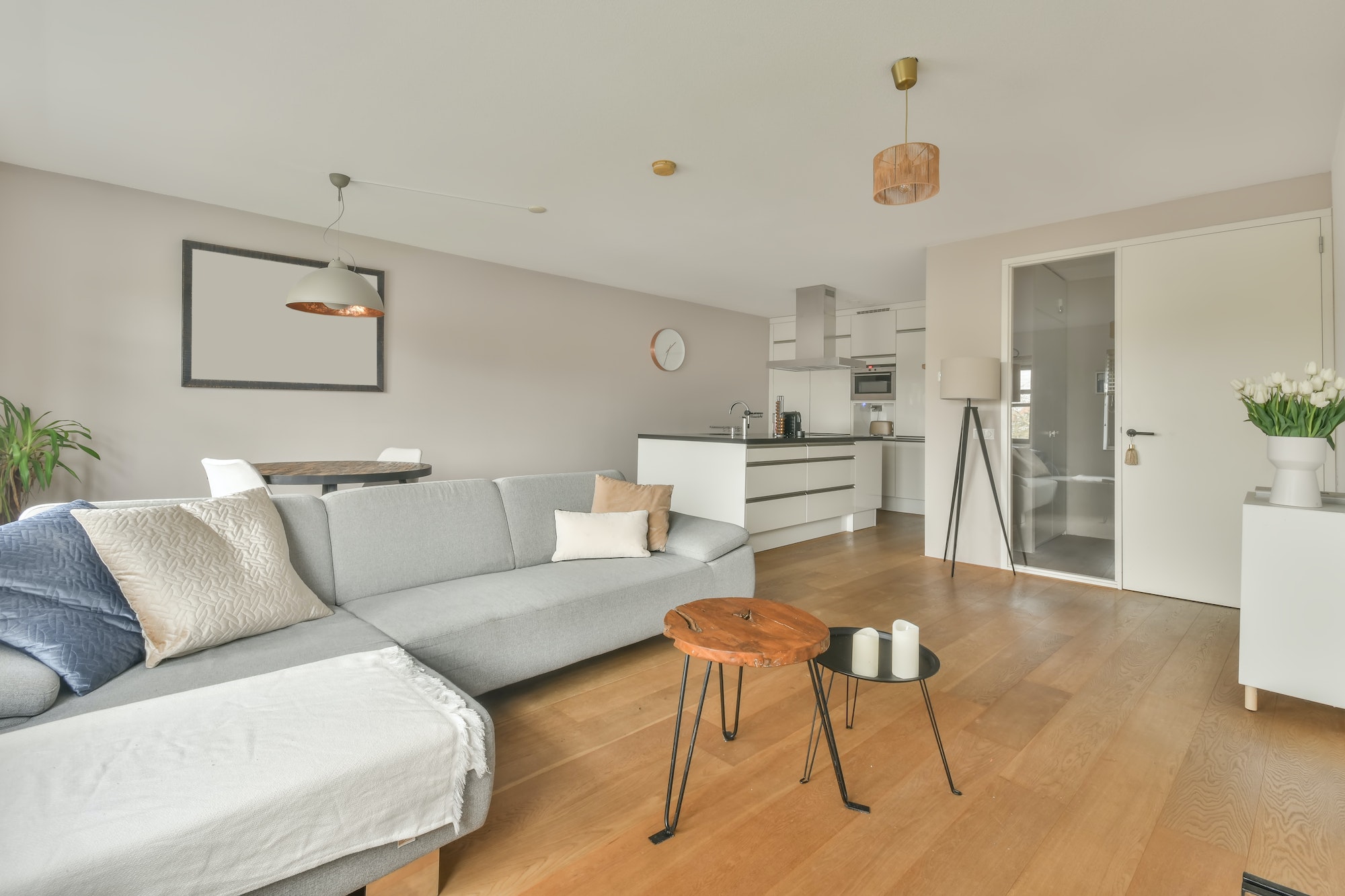 Spacious bright living room with a corner kitchen